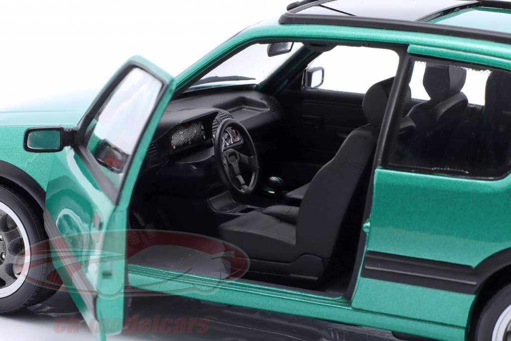 Peugeot 205 GTI Griffe Año de construcción 1991 verde metálico 1:18 Norev