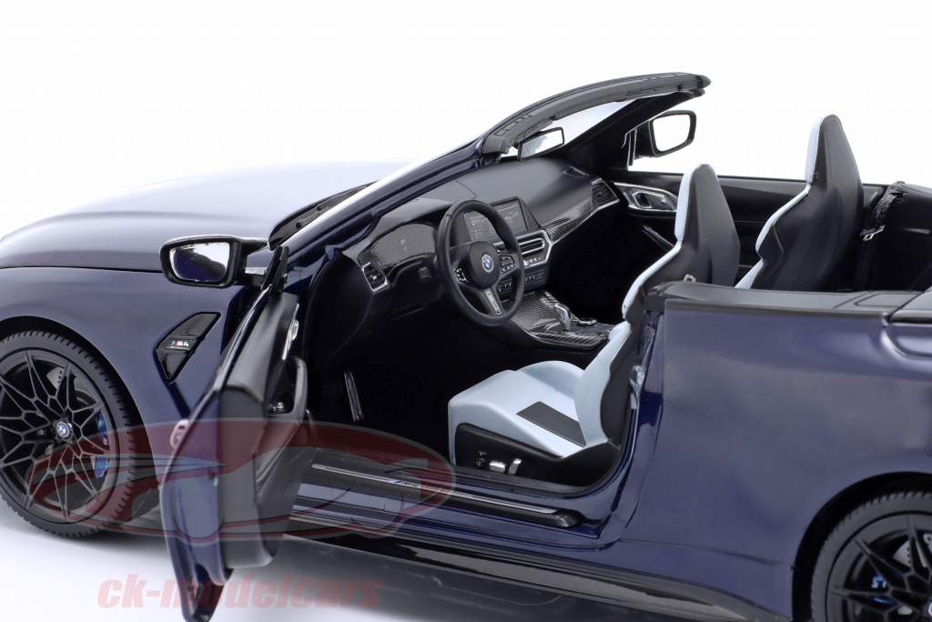 BMW M4 Cabriolet (G83) year 2021 dark blue metallic 1:18 Minichamps