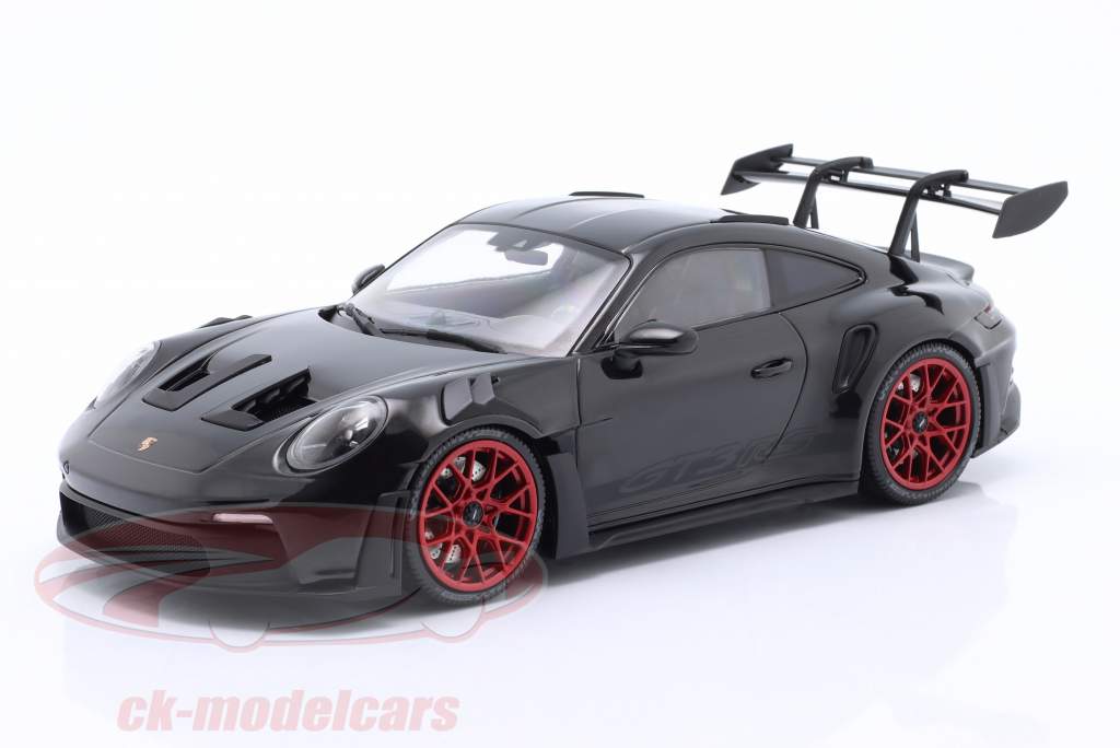 Porsche 911 (992) GT3 RS Baujahr 2023 schwarz / rote Felgen 1:18 Minichamps