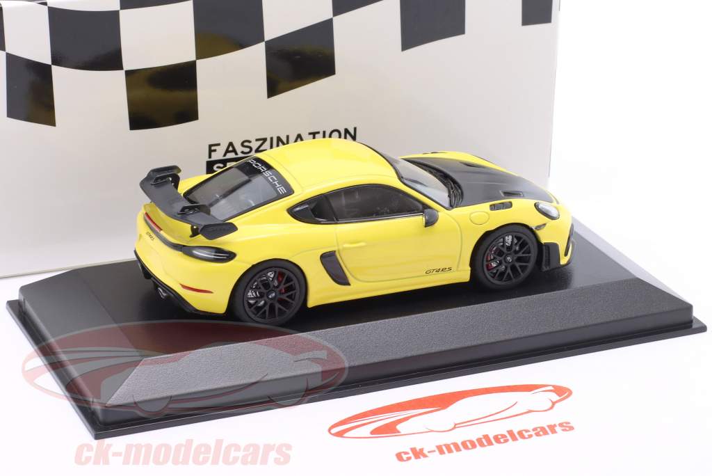 Porsche 718 (982) Cayman GT4 RS 2021 yellow / black rims 1:43 Minichamps