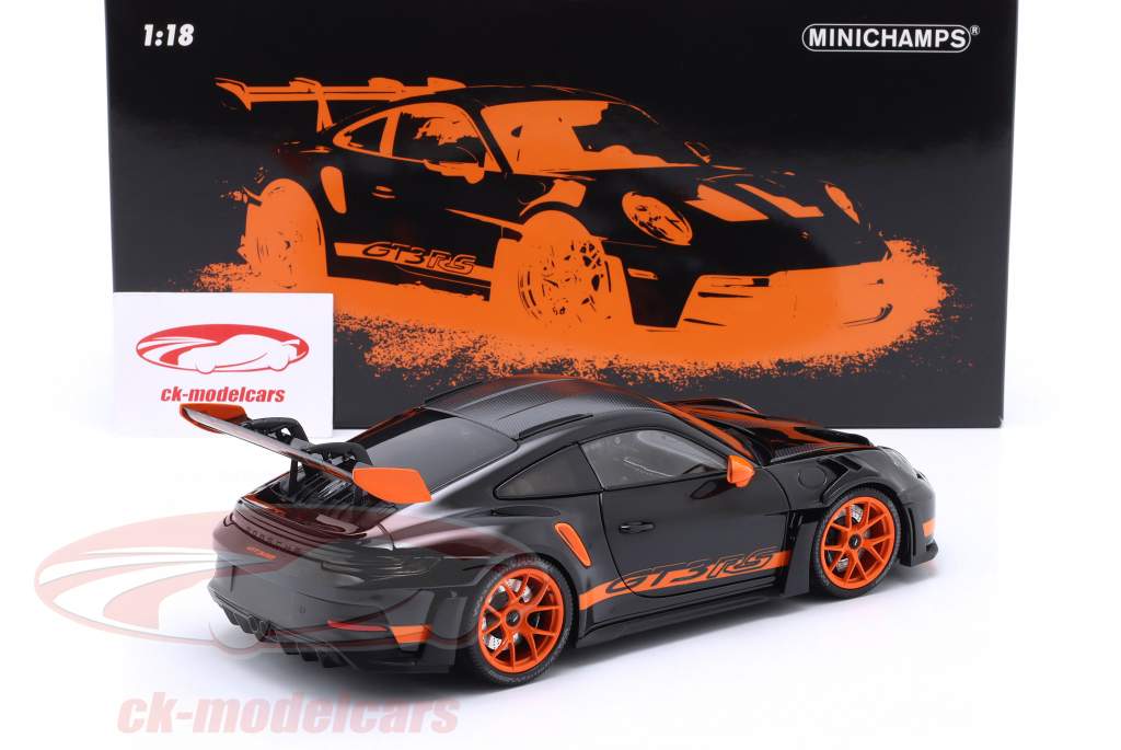 Porsche 911 (992) GT3 RS Año de construcción 2022 negro / naranja llantas 1:18 Minichamps