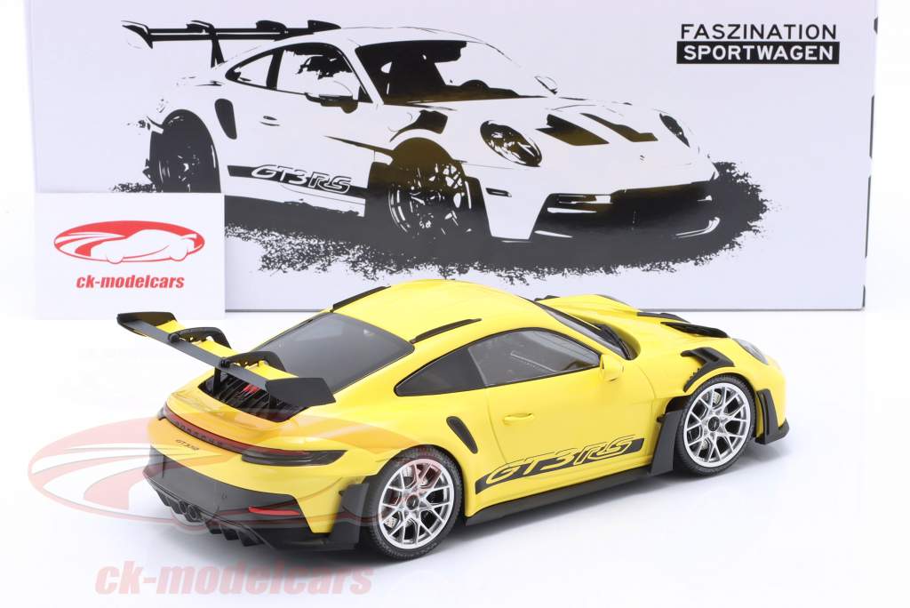 Porsche 911 (992) GT3 RS Año de construcción 2023 amarillo / plata llantas 1:18 Minichamps