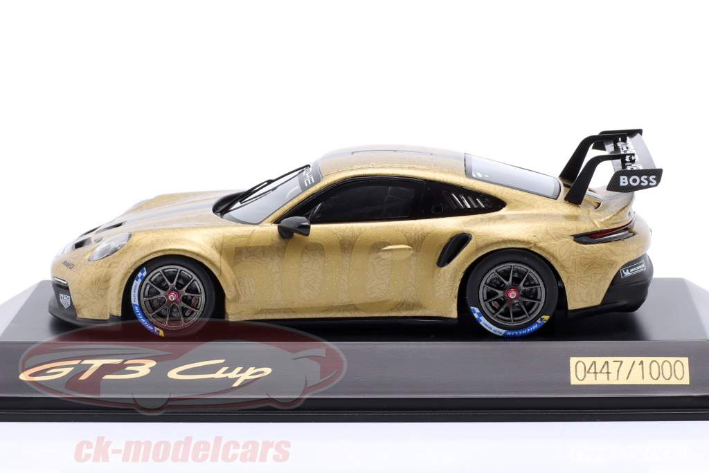 Porsche 911 (992) GT3 Cup 5000 oro metallico 1:43 Spark
