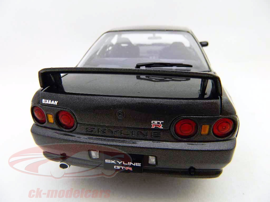 NISSAN Skyline GT-R 2002 rouge et noir - GODZILLA | Collect World NISSAN Skyline GT-R 2002 rouge et noir - GODZILLA | Collect World