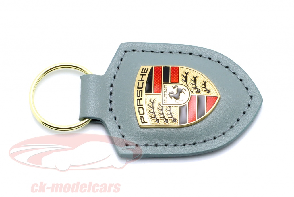 Porsche Original-Schlüsselanhänger, schwarzes Leder mit Metall, buntes  Wappen in silberfarbener Porsche-Geschenkbox : : Auto & Motorrad