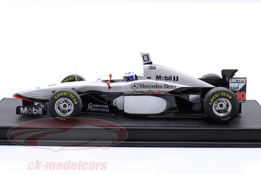 A collectible scale model McLaren MP4/12 from Minichamps F1