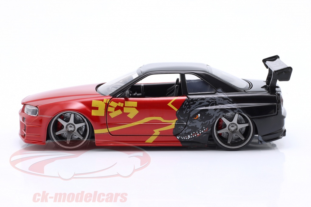 Jada Toys Godzilla modelauto Nissan Skyline GT-R (R34) 2002 - Godzilla vs. Destoroyah speelgoedauto van metaal met onderdelen om te openen, schaal 1:24 (19 cm), voor fans en verzamelaars vanaf 8 jaar