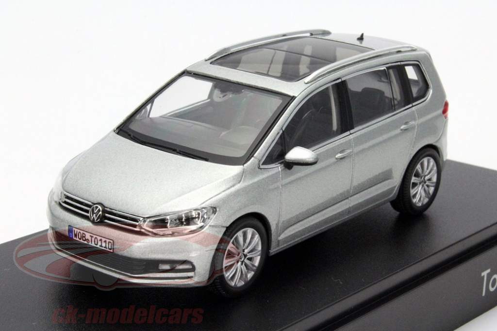 Volkswagen and Norev show model car of the new Touran